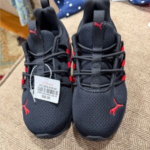 Puma Kids Black Sneakers with Red Accents